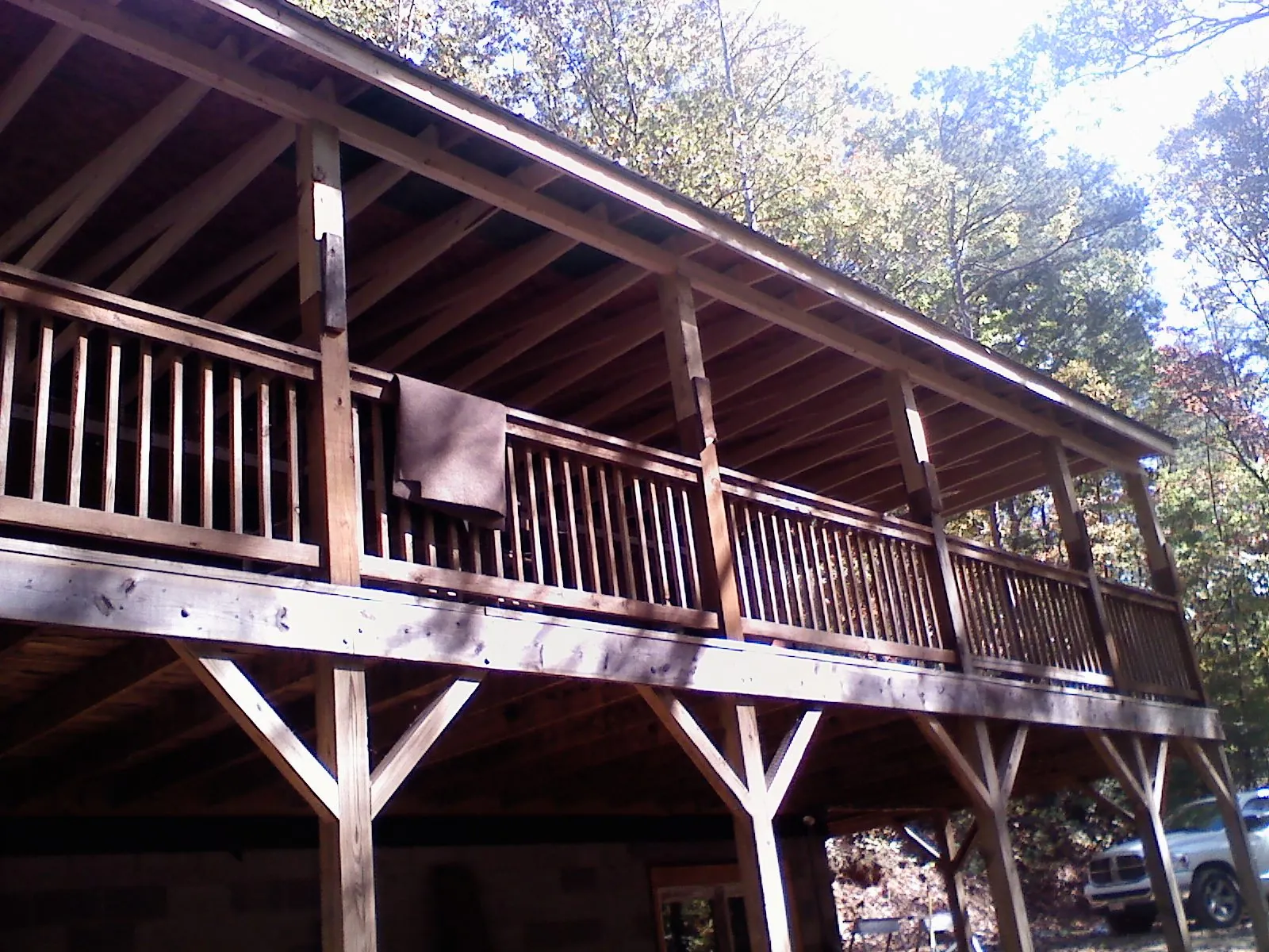 Timber framing under a new elevated porch and deck — Roof Leak Repair in Scio by Roofing Brothers